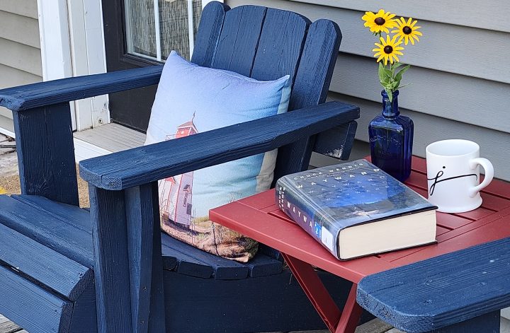 book, flowers, tea and muskoka chair